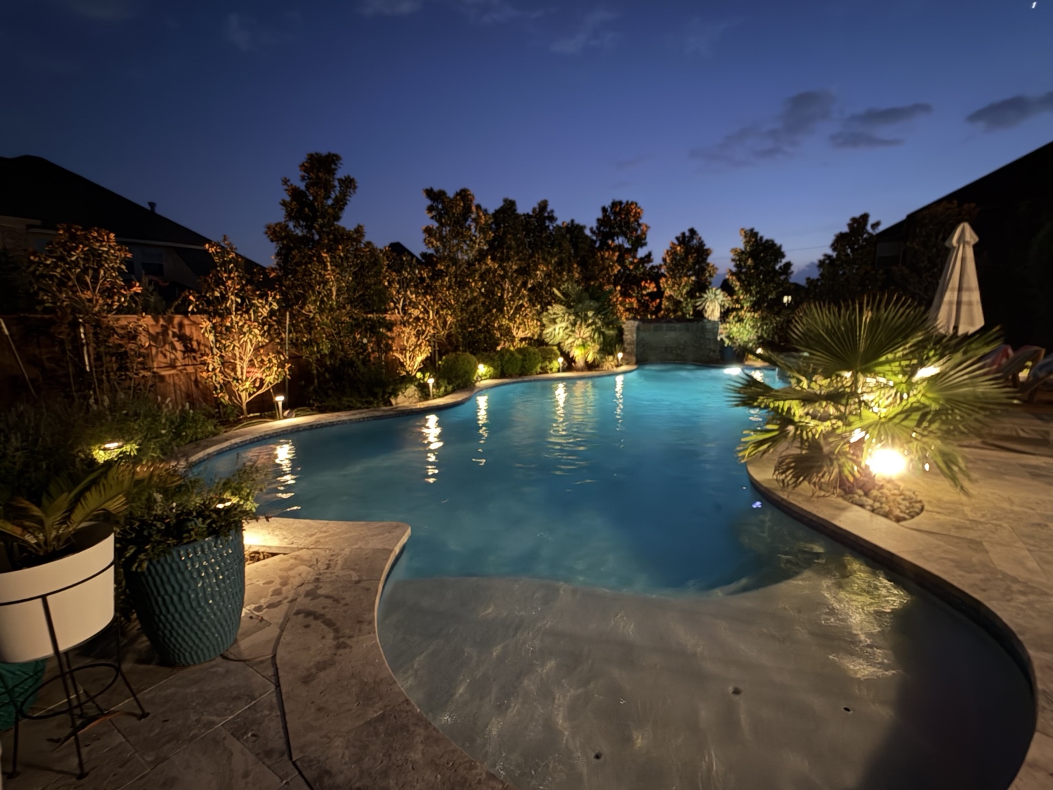Backyard pool landscape lighting